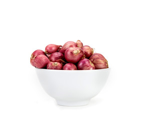 red onion or shallots in white bowl