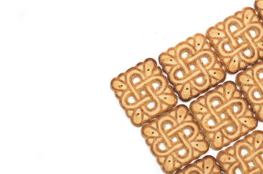 Square tea biscuits. Background. Photo.