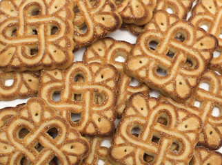 Square tea biscuits. Background. Photo.
