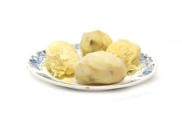 Boiled potatoes on a plate. Photo.