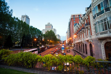 Fototapeta na wymiar Night city view traffic with Edificio Espana on background in Ma