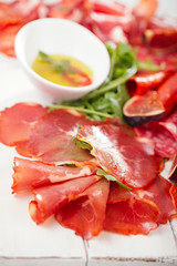 antipasti Platter of Cured Meat,   jamon, sausage, salame on whi