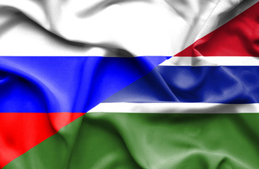 Waving flag of Gambia and Russia
