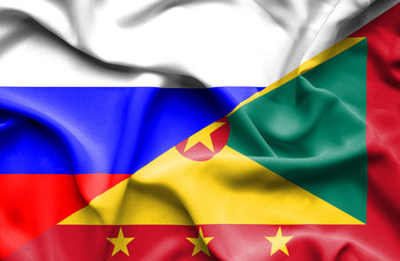 Waving flag of Guernsey and Russia