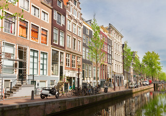 Fototapeta na wymiar old houses on canal, Amsterdam