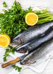 River trout with fresh tomatoes, lemon and herbs