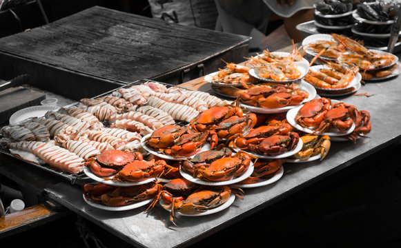 grilled seafood on floating market Ampawa, Thailand