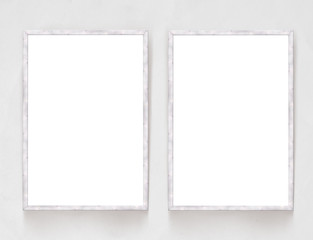 Two blank banners with wooden frame on plaster wall background