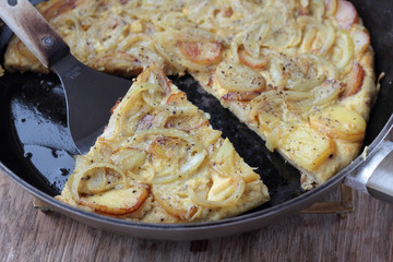Classic spanish tortilla with potatoes and onions.