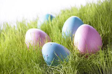 Many Decorative Easter Eggs On Green Grass
