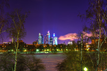 Moscow city skyscrapers by the winter night.