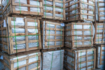 Building materials stacked in wooden frames