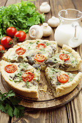 Kish with mushrooms and cherry tomatoes