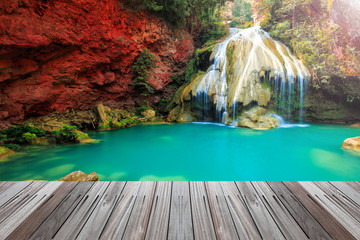 wonderful waterfall in thailand  with wooden floor