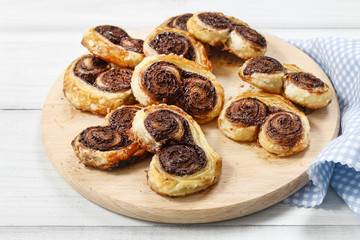 Palmier biscuits - french cookies made of puff pastry and chocol