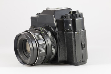 Fototapeta premium Old film SLR camera on white background