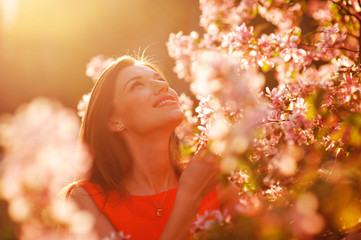 Pretty spring woman in the garden