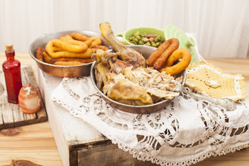 Roast chicken with potatoes chifeletti.