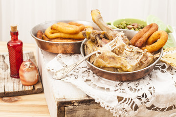Roast chicken with potatoes chifeletti.