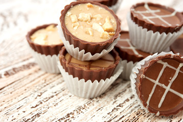 Dark chocolate on wooden background