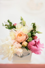 floral arrangement of peonies and roses