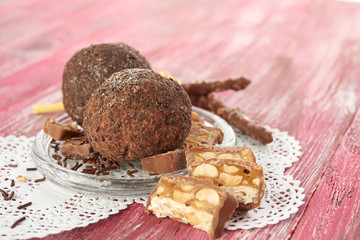 Cupcake with chocolate on wooden background