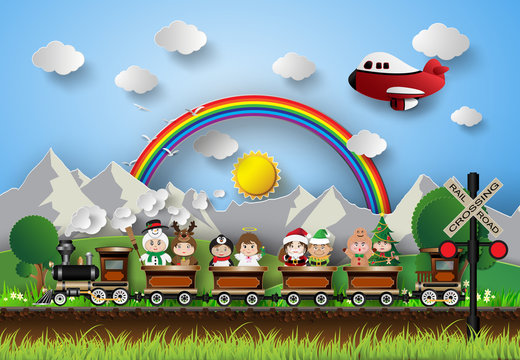 Children In Fancy Dress Sitting On A Train Running On The Tracks