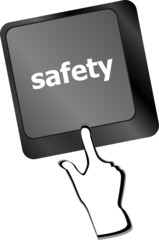 safety first concept with key on computer keyboard