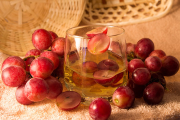 grapes and grape juice in a glass
