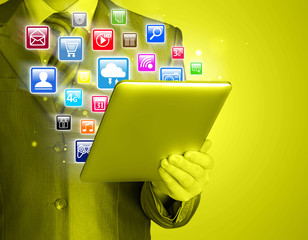 Business man use tablet pc with colorful application icons