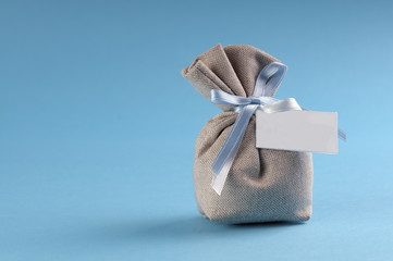 bag with sugared almonds for a new birth with copyspace