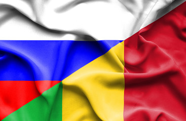 Waving flag of Mali and Russia