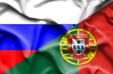 Waving flag of Portugal and Russia
