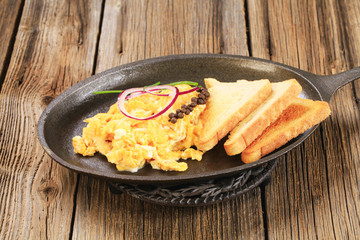 Scrambled eggs and toast