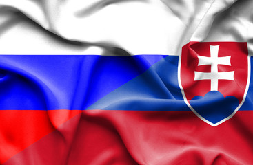 Waving flag of Slovakia and Russia