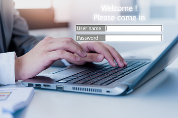 businessman using laptop loging in to website, business security