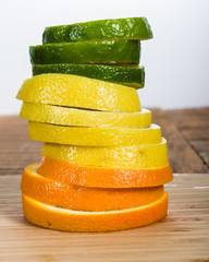 Fototapeta na wymiar Stack of lemon, lime orange
