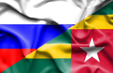 Waving flag of Togo and Russia
