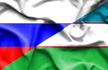 Waving flag of Uzbekistan and Russia