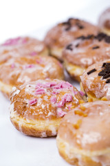 Fresh isolated donuts on white background