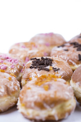 Fresh isolated donuts on white background