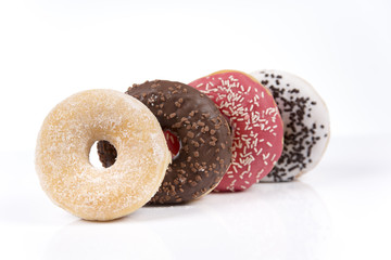 Fresh isolated donuts on white background