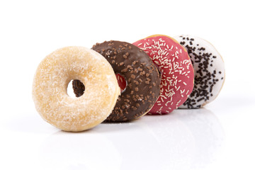 Fresh isolated donuts on white background