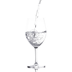 pure water is emptied into a glass of water