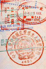 Fototapeta na wymiar Chinese customs stamp passport entry and exit arrivals departure photo