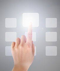 Man pressing a touchscreen button