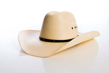 Straw Cowboy hat on white background
