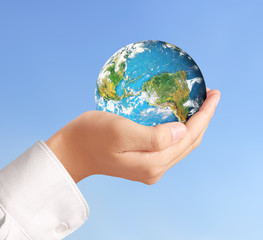 Globe ,earth in human hand