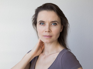 Fototapeta premium Woman with attractive smile looking into camera