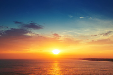 Obraz na płótnie Canvas Beautiful cloudscape over the sea, sunset shot